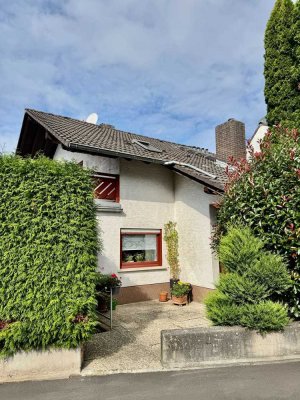 Einfamilienhaus mit Einliegerwohnung, Garten und Fernblick