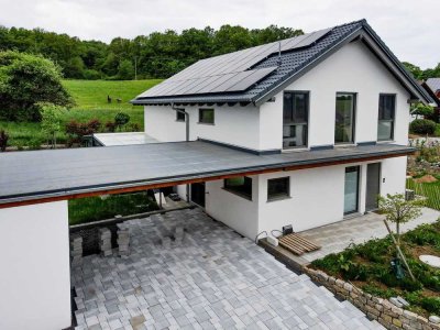 Stilvolles Neubau Einfamilienhaus – Wohnen mit Komfort und Weitblick in Sinntal-Breunings