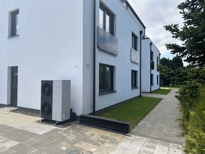 Erstbezug - Komfortable Neubauwohnung mit Terrasse, Gartenteil und barrierearmem Zugang zur Südseite
