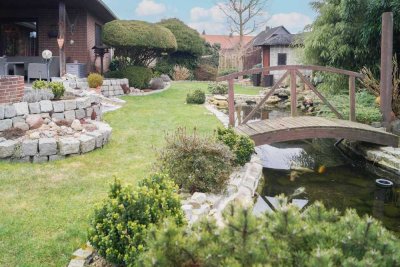 Platz für Familien: Bungalow mit Garten und Dachausbaureserve in beliebter Lage