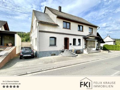 **Geräumiges Wohnhaus mit großzügiger Gewerbefläche in Atzelgift**