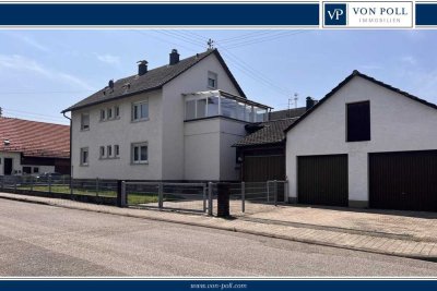 Zweifamilienhaus mit großem Grundstück und Nebengebäude