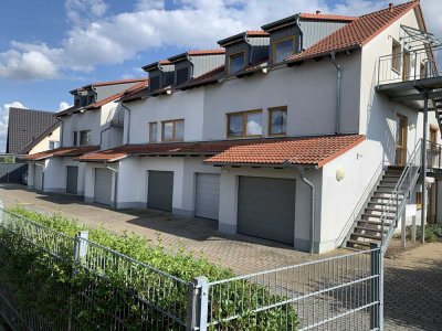 Exklusive EG-Wohnung, 90m² mit Garage, EBK, Wintergarten und Garten im ruhigen Baugebiet "Wiesenweg"