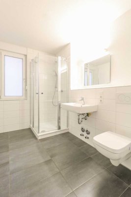 Charmante EG-Wohnung mit Balkon, moderner Markenküche und Tiefgaragenstellplatz