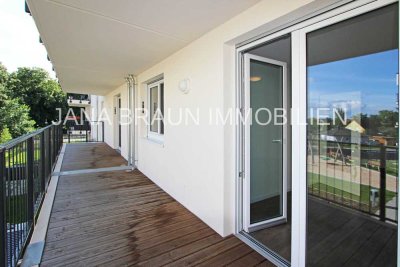 4 Zimmer-Wohnung mit großem Balkon, zwei Bädern und 2 TG-Plätzen