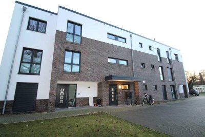 Moderne und energieeffiziente Erdgeschosswohnung mit Gartenteil und 2 Stellplätzen in Toplage!