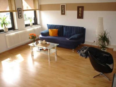 4-Zimmer-Wohnung mit EBK, Terrasse + Gartenanteil