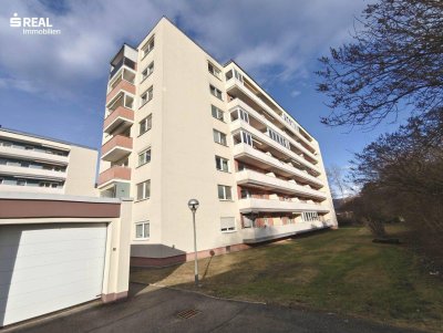 Lichtdurchflutete 3 Zimmer-Eigentumswohnung mit großzügiger 18 m² Westterrasse und beeindruckendem Ausblick