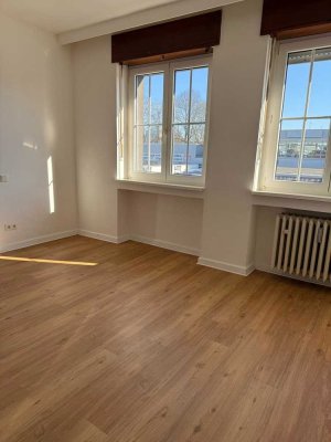 Helle & freundliche 2,5-Zimmer-Wohnung mit Balkon und Gemeinschaftsgarten