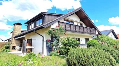 Erdgeschosswohnung mit direktem Gartenzugang, Terrasse und Garage