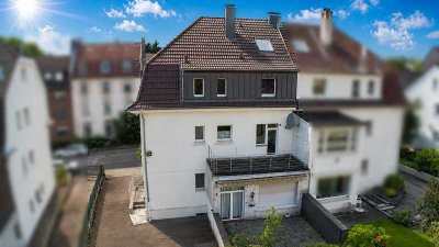 Attraktives Dreifamilienhaus mit drei Wohneinheiten und großem Grundstück nahe der Trasse