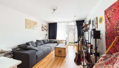 HEGERICH: Vermietete 1-Zimmer-Wohnung mit Balkon in direkter Lage am Olympia-Einkaufszentrum