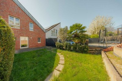 Modernes Wohnen mit Gartenidyll: Barrierearmes Erdgeschoss-Juwel in Bestlage
