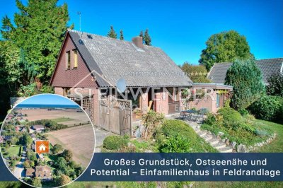 Großes Grundstück, Ostseenähe und Potential – Einfamilienhaus in Feldrandlage