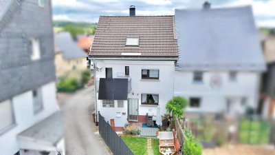 Einziehen & Wohlfühlen: Doppelhaushälfte mit Gartengrundstück in Mengerskirchen