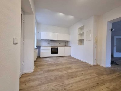 Erdgeschoßwohnung mit Einbauküche und Privatgarten!