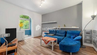 Charmante 2-Zimmer-Wohnung mit Gartenblick in gepflegtem Mehrfamilienhaus
