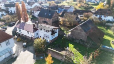 Gepflegtes Einfamilienhaus mit Gewerbefläche, Garten und vielen weiteren Nutzungsmöglichkeiten
