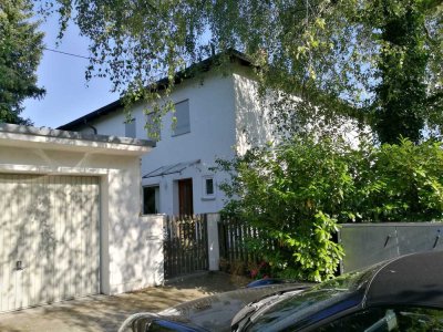 Helle, sonnige DHH mit Garten in Bogenhausen, München