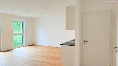 2 Zimmer mit Balkon und nachhaltiges Wohnen in Essling, in deckengekühlter Ruhelage und Stellplatz