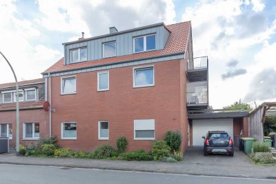 Vielseitiges Drei-Parteien-Haus mit Entwicklungspotenzial