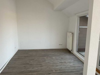 Moderne und großzügig geschnittene 2-Zimmer-Wohnung mit kleiner Dachterrasse