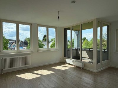 Modernes Wohnerlebnis auf zwei Ebenen mit Balkon!