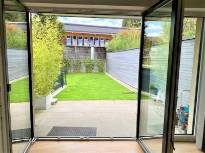 2 Zi. Erdgeschosswohnung in Seenähe mit sonniger Terrasse und Garten