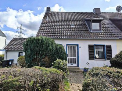 Charmantes Siedlungshaus mit Erweiterungsmöglichkeit auf großem Grundstück