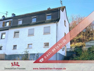 Trier-Kürenz: Zweifamilienhaus mit gut vermietbaren Wohnungen und neuwertiger Heizung – Ideal für Fa