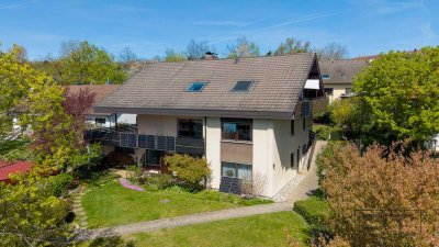 Architektur, die begeistert: Großzügiges MFH in ruhiger Top-Lage mit attraktivem Garten!
