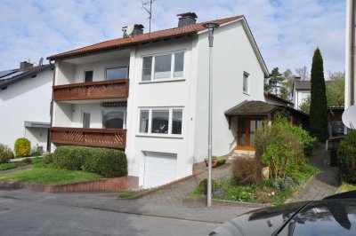 Ein Zuhause mit Herz–Großzügiges Zweifamilienhaus mit Garten