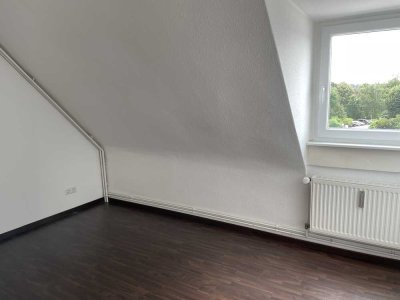 Dachgeschosswohnung in der Stadtmitte zu vermieten!