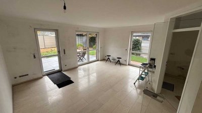 Hochwertige 3- Zimmer Erdgeschoss Wohnung mit Garten und Carport