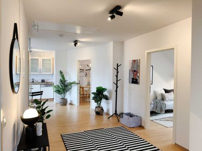 Lichtdurchflutete Dachgeschosswohnung mit historischem Charme und modernem Komfort