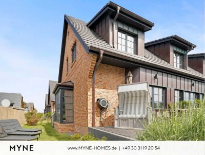 Ferienimmobilie im Miteigentum: Neubau-Strandhaus im Friesenstil mit Garten, Terrasse und Sauna