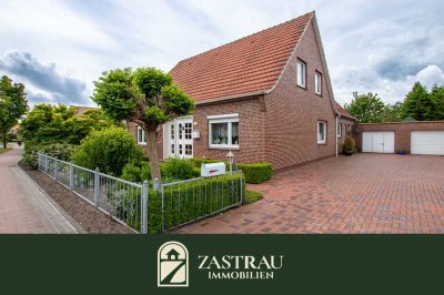 Großzügiges Einfamilienhaus mit drei Wohneinheiten und begehrtem Baugrundstück in Großheide