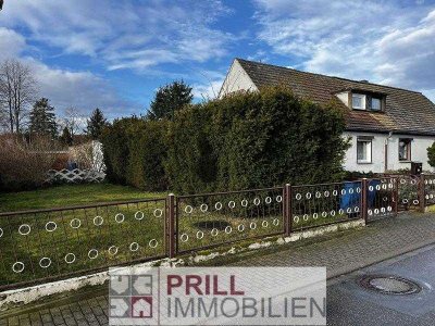 Doppelhaushälfte mit Potential in beliebter Siedlungslage // ca. 840 m² Grundstück // Garage