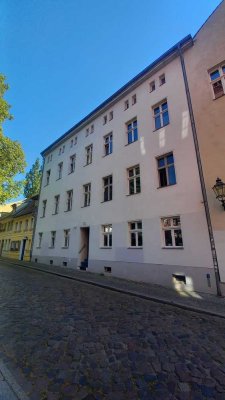 Hübsche 2-Zimmer-Wohnung mit Balkon inmitten des Zentrums