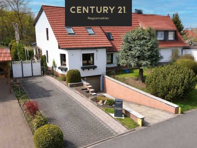 Großzügig Doppelhaushälfte mit Einliegerwohnung, Wintergarten & Wohlfühlambiente