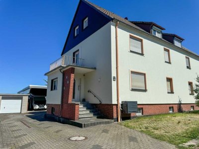 MFH mit 3 WHG, Vollkeller, Garage u. gr. Carport - 2 WHG bezugsfrei