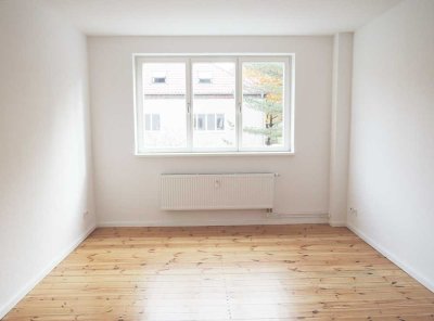 Stilvoll investieren im Märchenviertel – vermietete 2-Zimmer-Wohnung im Denkmal-Ensemble von 1927