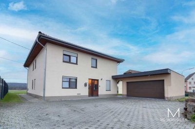 MG - Vermietetes Einfamilienhaus mit Garten und Garage in Spesbach