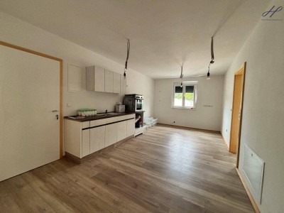 Erstbezug! - 4 Zimmer Erdgeschosswohnung mit Parkplatz