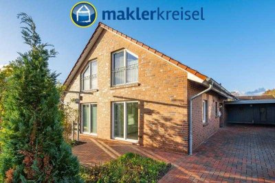 Bärenstadt Esens: Junges KFW-70 Zweifamilienhaus mit Carport in beliebter Siedlung!