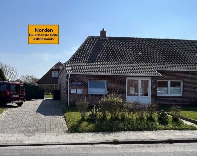 Ansprechende Doppelhaushälfte mit zwei voneinander getrennten Einheiten in beliebter Lage von Norden