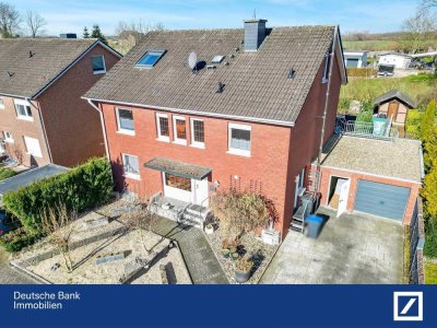 Familienfreundliche 5-Zimmer-Maisonette-Wohnung mit Balkon, Garten und Carport