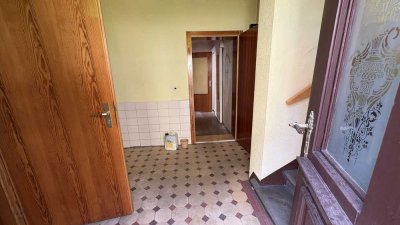 Großzügiges Mehrfamilienhaus mit Anbau, Gewerbehalle und vielseitigem Nutzungspotenzial