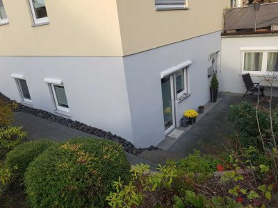 Freundliche 2-Zimmer-Souterrain-Wohnung mit Terrasse in Linz am Rhein