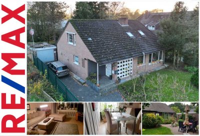 Zweifamilienhaus mit Wintergarten und vielseitigen Nutzungsmöglichkeiten auf tollem Grund !